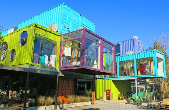 BZZ Arquitectura, shipping container mall, QUO Container Center, Cecilia Bertezzolo, EcoSan, Ingeniero Maschwitz, colorful containers, sustaimable shopping center, Buenos Aires, stacked shipping containers