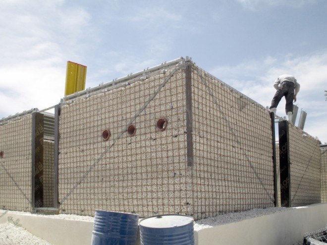 Cameron Sinclair, Pilosio, Pilosio Building Peace, Re:build, re:build construction system, solar panels, solar power, refugee camps, syrian refugees, syrian refugee architecture, syrian refugee camp, syrian refugee school, syrian refugee buildings, scaffolding tubes, phenolic film, plywood, rainwater collection, modular architecture, locally sourced materials, sustainable refugee architecture, Pouya Khazaeli