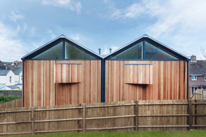 Adam Knibb, twin wooden homes, Cedar Lodges, Winchester, floating homes, cedar clad, window-less,