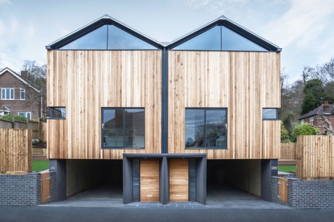 Adam Knibb, twin wooden homes, Cedar Lodges, Winchester, floating homes, cedar clad, window-less,
