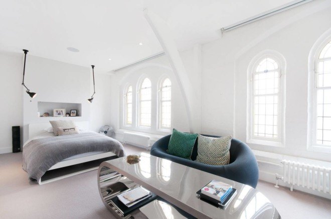 london church renovation, church converted into house, kensington london, london real estate, converted houses, open floor plan, stained glass, church architecture