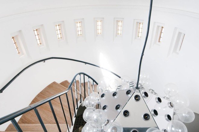 london church renovation, church converted into house, kensington london, london real estate, converted houses, open floor plan, stained glass, church architecture