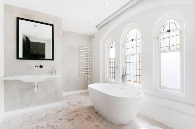 london church renovation, church converted into house, kensington london, london real estate, converted houses, open floor plan, stained glass, church architecture