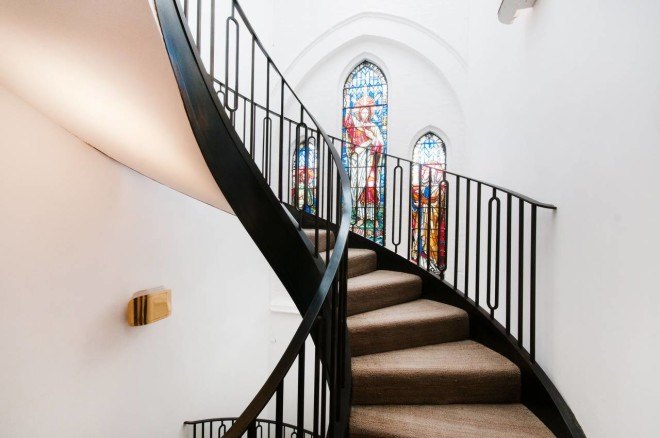 london church renovation, church converted into house, kensington london, london real estate, converted houses, open floor plan, stained glass, church architecture