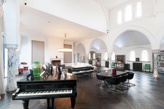 london church renovation, church converted into house, kensington london, london real estate, converted houses, open floor plan, stained glass, church architecture