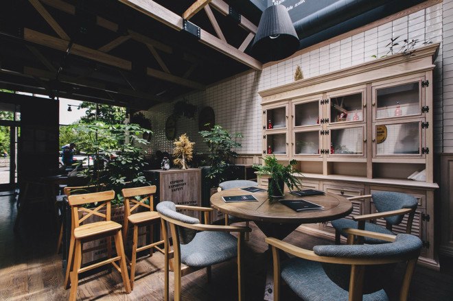 YØDEZEEN, bakery, interior design, green interior, green lighting, Roderick Vos, furniture design, hanging planters, hanging plants, wooden interior, green design