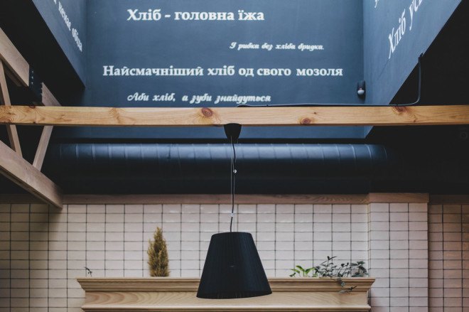 YØDEZEEN, bakery, interior design, green interior, green lighting, Roderick Vos, furniture design, hanging planters, hanging plants, wooden interior, green design