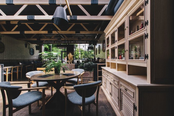 YØDEZEEN, bakery, interior design, green interior, green lighting, Roderick Vos, furniture design, hanging planters, hanging plants, wooden interior, green design