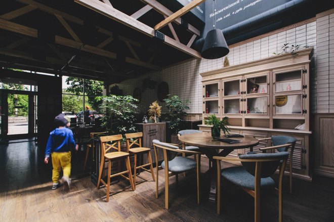 YØDEZEEN, bakery, interior design, green interior, green lighting, Roderick Vos, furniture design, hanging planters, hanging plants, wooden interior, green design