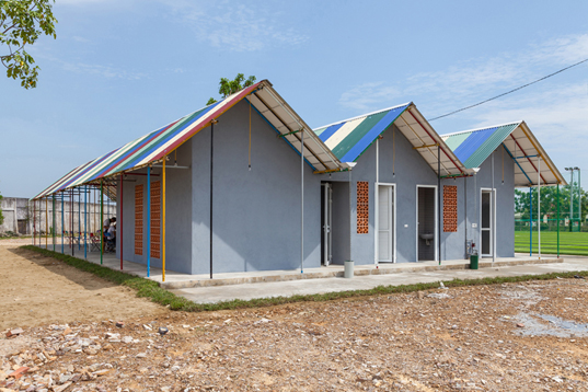 Re-ainbow, H&P Architects, Re Ainbow h&P, re-use, material re-use, social design, community center, solar power, gray water, water reuse, water collection, solar power structures, reader submission