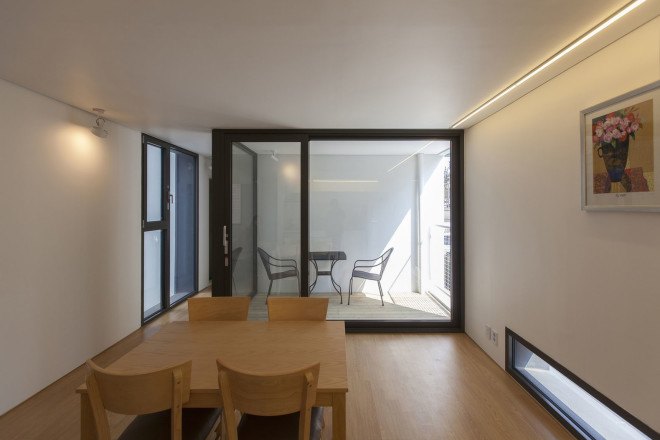 Archihood WXY, Seoul, residential architecture, common spaces, natural light, natural ventilation, green architecture, courtyard, exposed concrete, wooden flooring, multi-family housing