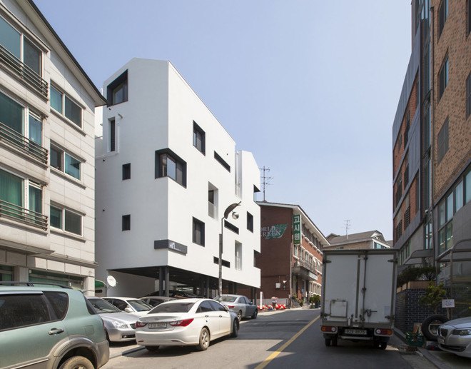 Archihood WXY, Seoul, residential architecture, common spaces, natural light, natural ventilation, green architecture, courtyard, exposed concrete, wooden flooring, multi-family housing