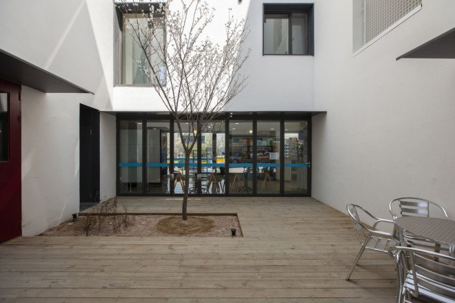 Archihood WXY, Seoul, residential architecture, common spaces, natural light, natural ventilation, green architecture, courtyard, exposed concrete, wooden flooring, multi-family housing
