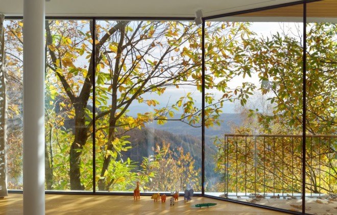MultiPlan arhitekti, panoramic views, House Katarina, House Katarina by MultiPlan arhitekti, modern treehouse, open plan living area, open plan layout, green roof garage, floor to ceiling glazing, modern architecture, minimalist aesthetic, natural light,