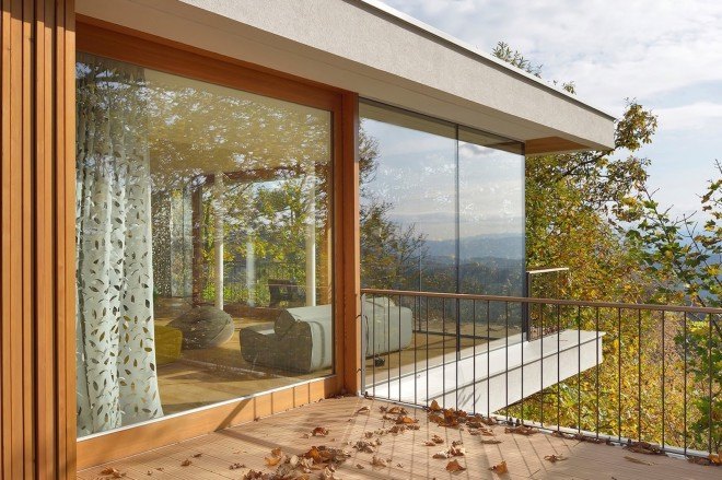 MultiPlan arhitekti, panoramic views, House Katarina, House Katarina by MultiPlan arhitekti, modern treehouse, open plan living area, open plan layout, green roof garage, floor to ceiling glazing, modern architecture, minimalist aesthetic, natural light,