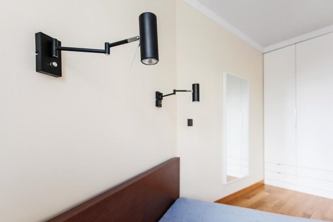 Mode:lina Architekci, Poland, Poznan, apartment design, flexible spaces, open-plan layout, natural materials, wooden interior, green interior, storage spaces