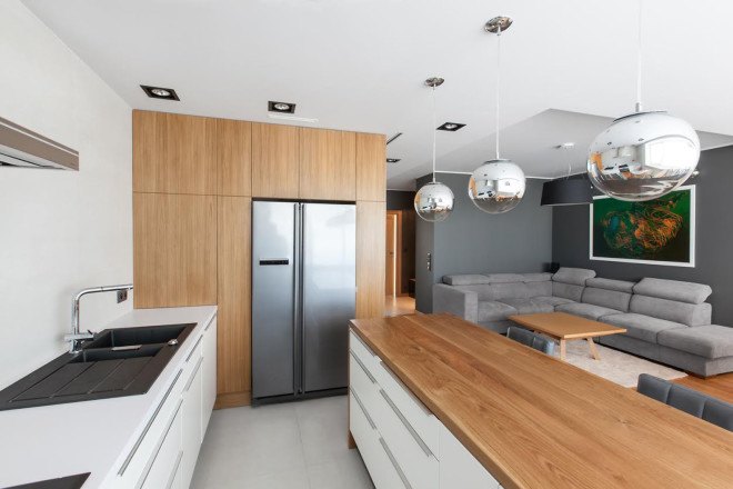 Mode:lina Architekci, Poland, Poznan, apartment design, flexible spaces, open-plan layout, natural materials, wooden interior, green interior, storage spaces