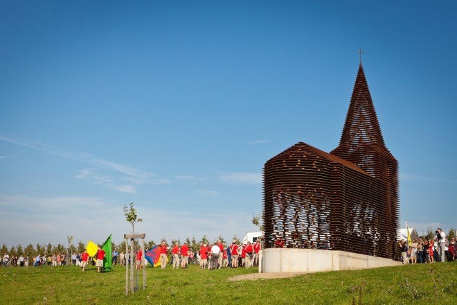 Limburg, Z33, Art museum Z33, Z-Out art program, Pieterjan Gijs, Arnout Van Vaerenbergh, Gijs Van Vaerenbergh, Reading Between the Lines, traditional church, public space intervention, public art space, public art, see through church, semi transparent church, weathered steel, Belgium, church, Reading between the lines by Gijs Van Vaerenbergh
