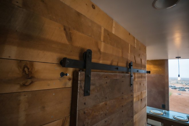 Design Build BLUFF, University of Colorado Denver, reclaimed wood, reclaimed barn wood, weathered steel, Colorado desert, Blue Mountains, Monument Valley, cabin, cabins, Navajo Nation, Mexican Water Chapter of the Navajo Nation,