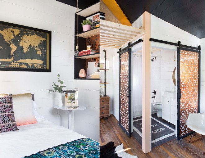 Austin, Kim Lewis, midcentury, bohemian design, tiny home, tiny house, tiny mobile home, mobile home, breezeway, Parasoleil, perforated copper, repurposed wood, salvaged wood, two mobile trailer home, tiny Austin home
