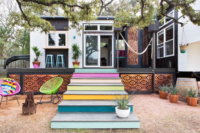 Austin, Kim Lewis, midcentury, bohemian design, tiny home, tiny house, tiny mobile home, mobile home, breezeway, Parasoleil, perforated copper, repurposed wood, salvaged wood, two mobile trailer home, tiny Austin home
