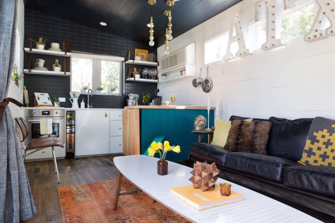 Austin, Kim Lewis, midcentury, bohemian design, tiny home, tiny house, tiny mobile home, mobile home, breezeway, Parasoleil, perforated copper, repurposed wood, salvaged wood, two mobile trailer home, tiny Austin home