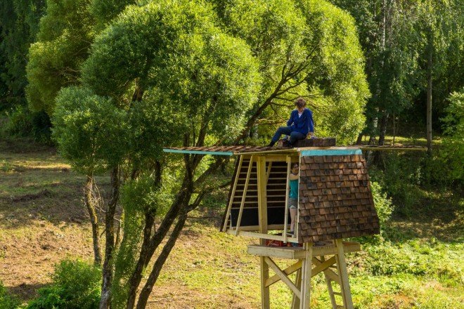 Wild Thing, Riga Technical University, Riga Technical University International Summer School, architecture, student projects, treehouse, rewilding, tiny cabins, bird hide, revegetation, Latvia, recycled building materials, wood, wooden structures, Wild Thing cabin in Latvian meadow,