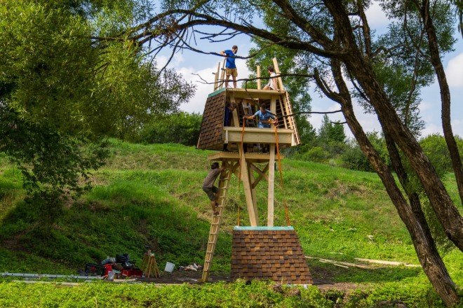 Wild Thing, Riga Technical University, Riga Technical University International Summer School, architecture, student projects, treehouse, rewilding, tiny cabins, bird hide, revegetation, Latvia, recycled building materials, wood, wooden structures, Wild Thing cabin in Latvian meadow,