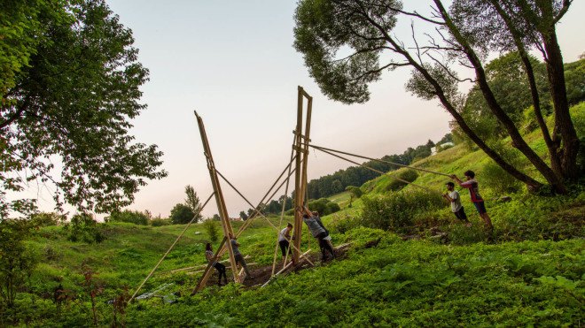 Wild Thing, Riga Technical University, Riga Technical University International Summer School, architecture, student projects, treehouse, rewilding, tiny cabins, bird hide, revegetation, Latvia, recycled building materials, wood, wooden structures, Wild Thing cabin in Latvian meadow,
