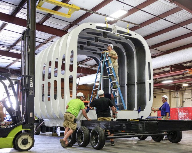 AMIE, SOM, 3d-printed building powered by a car, Department of Energy, Oak Ridge National Lab, ORNL 3d-printed car, building integrated photovoltaics, 3d-printed structure powered by a car, SOM 3d-printed building, SOM-designed 3D-printed building powered by a car, houses powered by cars, University of Tennessee house and car design with DOE