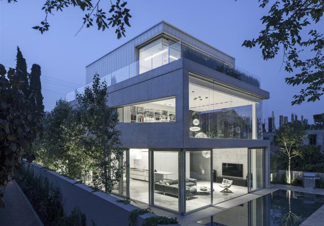 Concrete Cut House, Tel-Aviv, Israel, Pitsou Kedem Architects, concrete, daylit spaces, glass facade, chandelier, swimming pool, family home