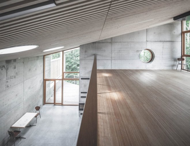 Copenhagen, Sophus Søbye Arkitekter, multipurpose space, multiuse space, shingles, pitched roof, concrete architecture, meeting place, community center, green architecture, timber structure, courtyard