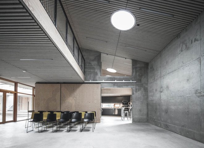 Copenhagen, Sophus Søbye Arkitekter, multipurpose space, multiuse space, shingles, pitched roof, concrete architecture, meeting place, community center, green architecture, timber structure, courtyard