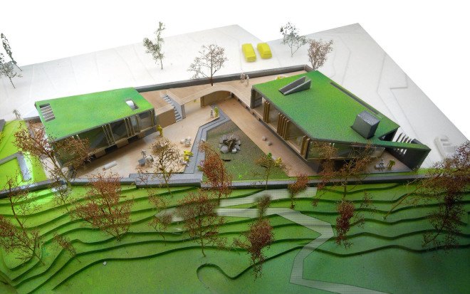 Copenhagen, Sophus Søbye Arkitekter, multipurpose space, multiuse space, shingles, pitched roof, concrete architecture, meeting place, community center, green architecture, timber structure, courtyard