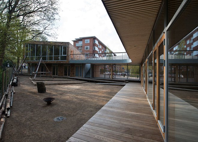 Copenhagen, Sophus Søbye Arkitekter, multipurpose space, multiuse space, shingles, pitched roof, concrete architecture, meeting place, community center, green architecture, timber structure, courtyard