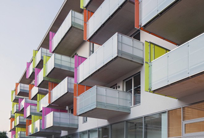 Glanhof housing, glass facade, multifamily housing, social housing, Austria, Architects Collective, solar design, solar panels, heat pump, geothermal, solar power, green architecture