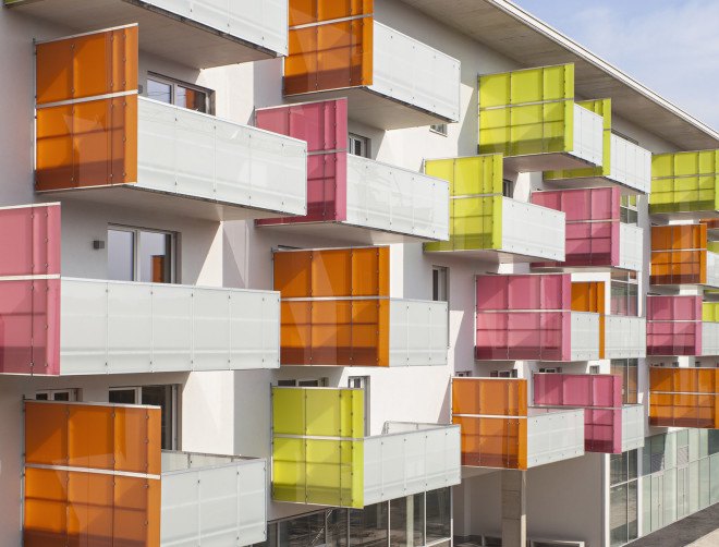 Glanhof housing, glass facade, multifamily housing, social housing, Austria, Architects Collective, solar design, solar panels, heat pump, geothermal, solar power, green architecture