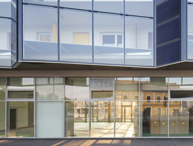 Glanhof housing, glass facade, multifamily housing, social housing, Austria, Architects Collective, solar design, solar panels, heat pump, geothermal, solar power, green architecture