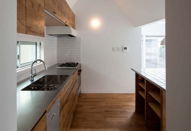 Housecut, Starpilots, Japan, Tokyo, pitched roof, natural light, shingles, wood flooring, transparent facade, daylit spaces, green architecture, Japanese architecture