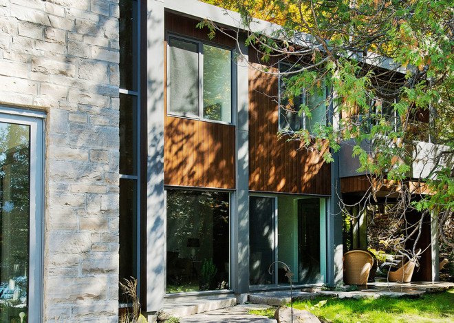 Boom Town, Eric Joseph Tremblay, Canada, chalet, wooden cladding, cedar cladding, stone, natural materials, floor-to-ceiling windows, Canada, natural light, daylit spaces, mountain retreat