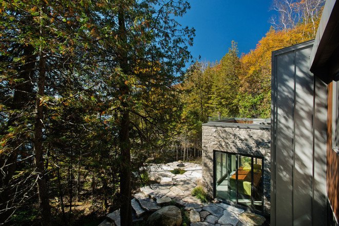 Boom Town, Eric Joseph Tremblay, Canada, chalet, wooden cladding, cedar cladding, stone, natural materials, floor-to-ceiling windows, Canada, natural light, daylit spaces, mountain retreat