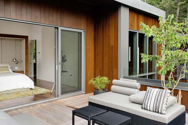 Boom Town, Eric Joseph Tremblay, Canada, chalet, wooden cladding, cedar cladding, stone, natural materials, floor-to-ceiling windows, Canada, natural light, daylit spaces, mountain retreat