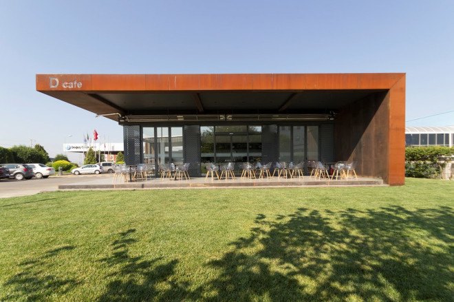 D Cafe, Dogus Automotive AS, Turkey, green interiors, recycled metal, metal facade, perforated facade, green architecture, natural lighting, floor-to-ceiling window