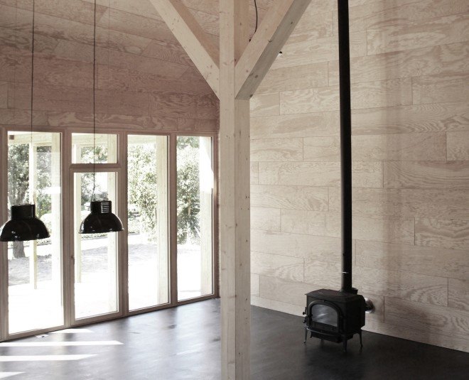 prefab housing, Tom Munz Architekt, House at Lake Constance by Tom Munz Architekt, Lake Constance, wooden home, timber home, prefab timber home, French Aleppo pine, open plan layout, larch, sustainably sourced wood, Egnach