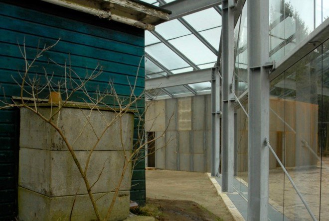 Oving Architecten, Holocaust Memorial, Kamp Westerbork, glass-enclosed home, urban memorials, holocaust memorials netherlands, dutch concentration camps, SS commander Albert Konrad Gemmeker, Anne Frank, modern holocaust sites,