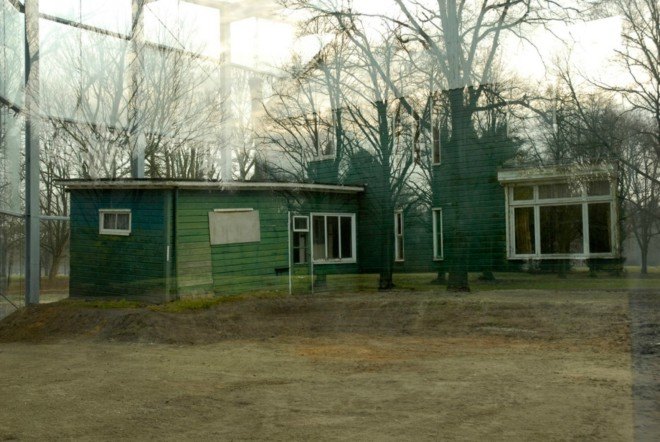 Oving Architecten, Holocaust Memorial, Kamp Westerbork, glass-enclosed home, urban memorials, holocaust memorials netherlands, dutch concentration camps, SS commander Albert Konrad Gemmeker, Anne Frank, modern holocaust sites,