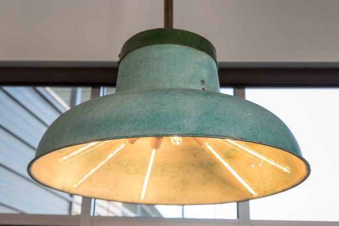 green renovation, The LARK, hotel, green hotel, Montana, Bozeman, local community, local artwork, fireplace, open-space patio, vintage design