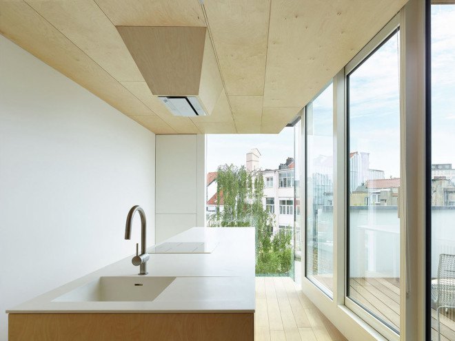 Edouard Brunet, François Martens, Maison De Tière, green renovation, Brussels, mezzanine, cantilever, apartment renovation, birch wood, small spaces, natural light