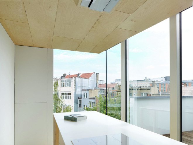 Edouard Brunet, François Martens, Maison De Tière, green renovation, Brussels, mezzanine, cantilever, apartment renovation, birch wood, small spaces, natural light