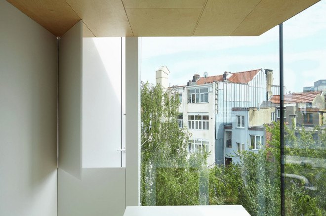 Edouard Brunet, François Martens, Maison De Tière, green renovation, Brussels, mezzanine, cantilever, apartment renovation, birch wood, small spaces, natural light